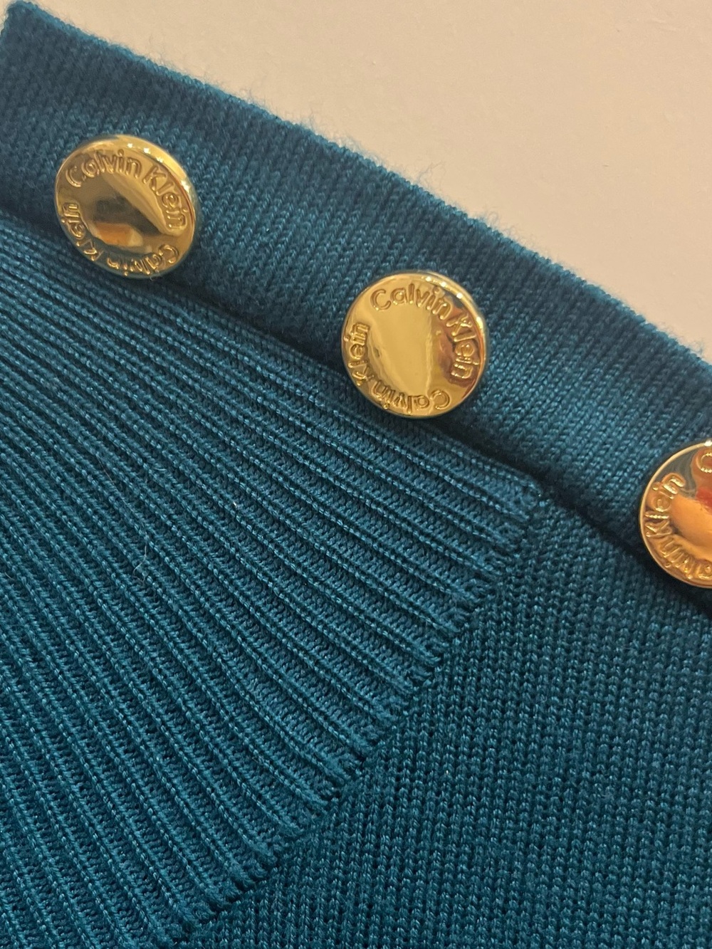 Teal Calvin Klein Mock-Neck Sweater Featuring Gold-Toned Shoulder Buttons